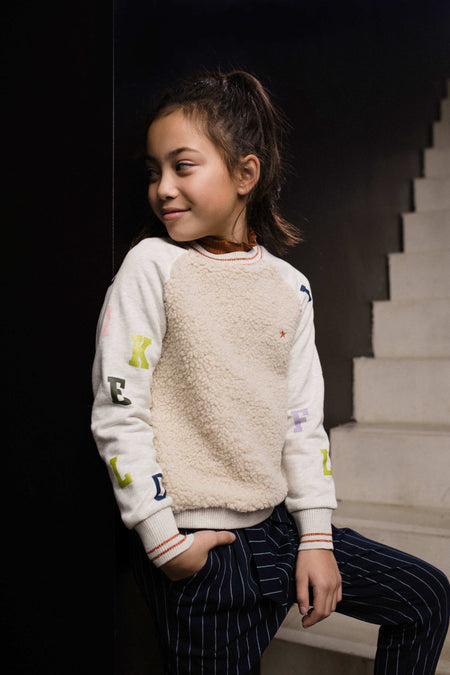 <transcy>Blusa Tipi Reciclada PL</transcy>