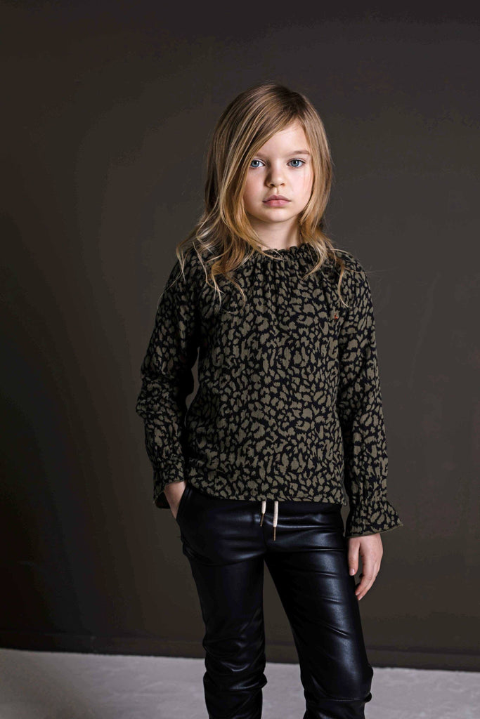 <transcy>Elegante blusa de doble tela</transcy>